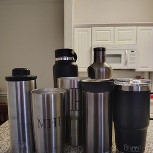 YETI Stainless Steel and Black Tumbler Collection Some are different brands